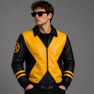May include: A black and yellow leather jacket featuring a prominent yellow X-shaped design across the chest, a black collar, and a circular yellow X logo on the right sleeve. The sleeves have two yellow horizontal stripes near the black ribbed cuffs.
