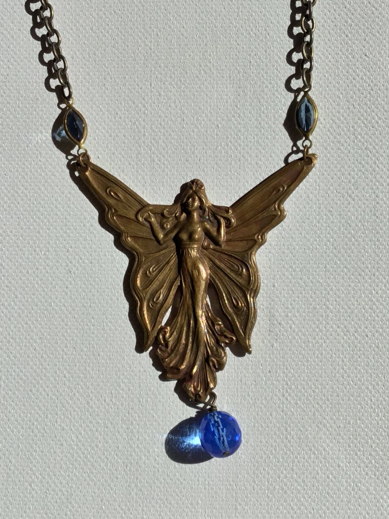Vintage Flying Fairy Brass Necklace with Blue Crystal Accents