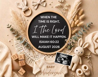 May include: A round black sign with white text reading WHEN THE TIME IS RIGHT, I THE LORD WILL MAKE IT HAPPEN. ISAIAH 60:22 AUGUST 2026. Includes a beige baby sweater with BABY ANDERSON, a crochet rabbit, wooden blocks, baby booties, and a sonogram.