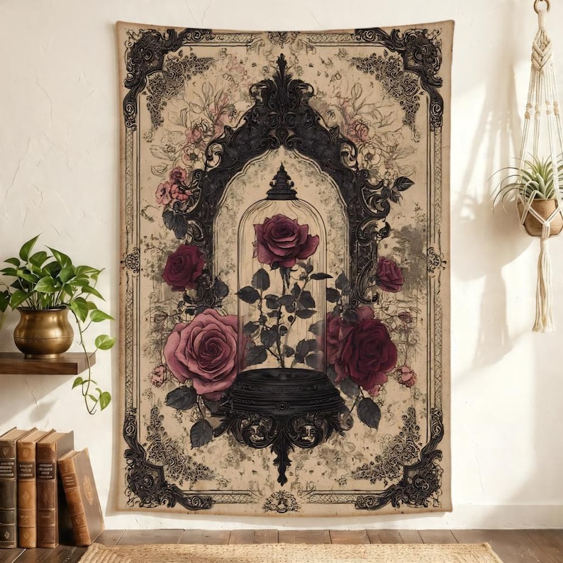 May include: A rectangular wall tapestry featuring a central illustration of a single rose inside a glass cloche, surrounded by larger blooming roses. The design is framed by an ornate black border on a beige background with intricate floral details.