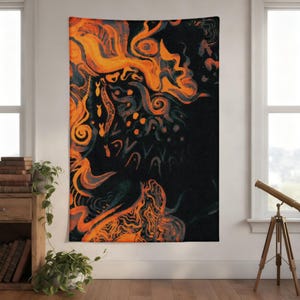 May include: Abstract wall tapestry with a dark background and vibrant orange and gray swirling patterns. The design features organic shapes and forms, creating a dynamic and artistic visual. This tapestry is suitable for adding a touch of modern art to any room.