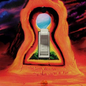 May include: A light switch cover painted with a surreal landscape. The switch is in the "ON" position. The text "The Door Unlocked The Flash Needs a Ride" is written below the switch. The text "Monaco Toys" is written at the bottom of the cover.