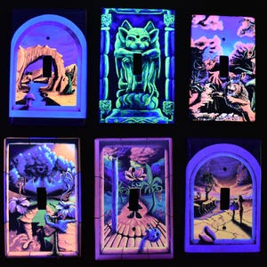 May include: Six unique, hand-painted light switch covers with surreal, glowing artwork. Each cover features a different design, including a gargoyle, a lion, and fantastical landscapes, all in vibrant neon colors. The covers are rectangular with a cutout for the switch.