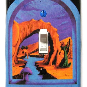 May include: A light switch cover with a psychedelic image of a desert landscape with a blue sky, orange rock formations, a river, a mushroom, and a green creature. The switch is white and says "ON".