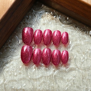 Ongles à presser oeil de chat rouge rubis : faux ongles Gala magnétiques à paillettes