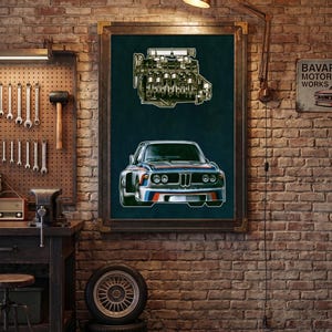 May include: A framed rectangular wall art piece featuring a detailed illustration of a vintage BMW engine positioned above a front-facing view of a classic BMW coupe with blue, red, and white racing stripes on a dark teal background.