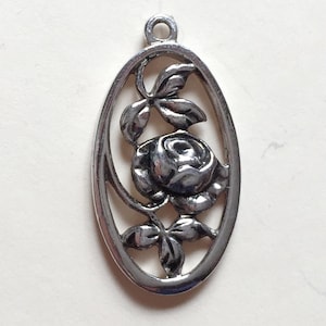 Vintage 1970s Silver Toned Charm Pendant of a Rose in an Oval by Avon VFG