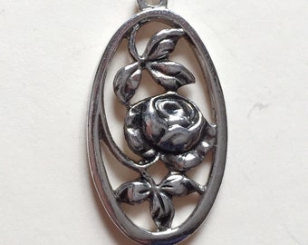 Vintage 1970s Silver Toned Charm Pendant of a Rose in an Oval by Avon VFG