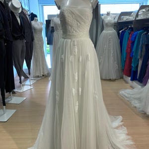 bridesmaid dresses neutral Pronovias: Hero – Camellia Wedding Gown | Bridal Store