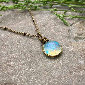Fairy Dust Necklace: Grass Green Iridescent Glass, Antiqued Brass, Fairycore Jewelry