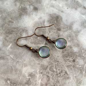 Photo reference showcasing the reverse side of the earrings.