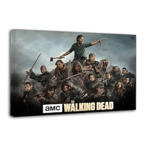 Puede incluir: Impresión en lienzo que presenta un grupo de personas de la serie de televisión The Walking Dead. La imagen muestra un grupo de personas con armas, sobre un fondo nublado. Los logotipos de AMC y The Walking Dead son visibles.
