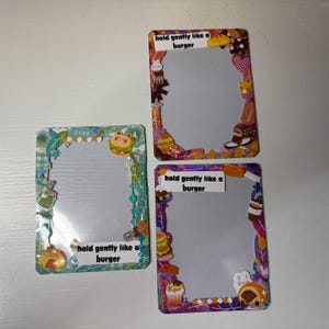 May include: A set of three ceramic mugs with a speckled, matte finish. The mugs are in shades of cream, light gray, and dark gray. Each mug has a simple, minimalist design, perfect for coffee or tea.