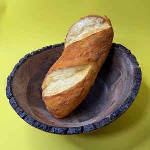 May include: A set of three ceramic mugs with a speckled, matte finish. The mugs are in shades of cream, light gray, and dark gray. Each mug has a simple, minimalist design and a rounded handle. Perfect for coffee or tea.