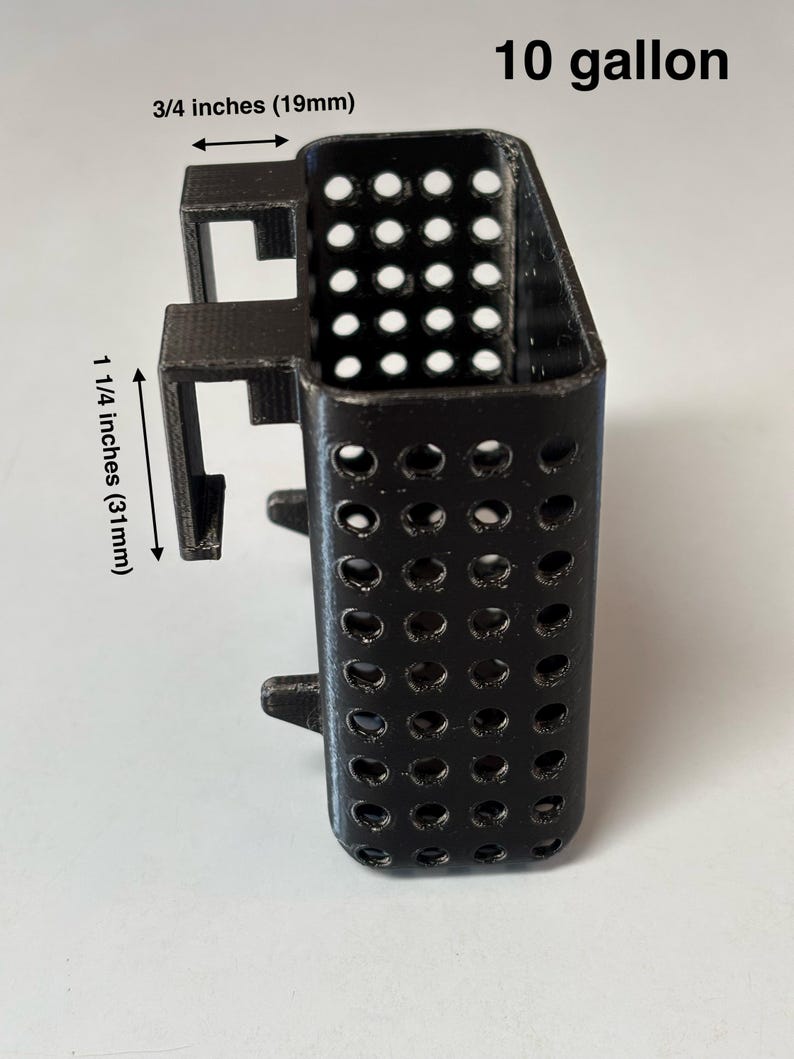 May include: Black plastic 10-gallon aquarium filter holder. The holder is 3/4 inches (19mm) wide and 1 1/4 inches (31mm) tall. The holder has many small holes and is designed to hold a filter.