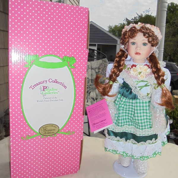 Treasury Collection World's Finest Porcelain Doll "Heidi" Music Box that plays " I'm looking over a four leaf clover"