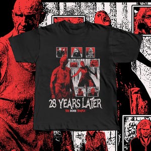 May include: Black t-shirt with a red graphic design. The text reads "28 YEARS LATER" and "THE BONE TEMPLE". The design incorporates red and white images of figures, creating a horror movie theme.