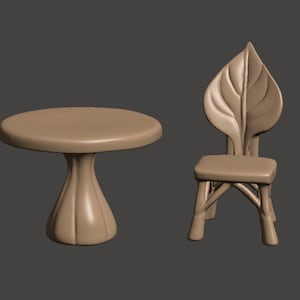 May include: A miniature beige table and chair set. The table has a round top and a bulbous base. The chair features a leaf-shaped backrest and a square seat. The set is made of a solid, smooth material.