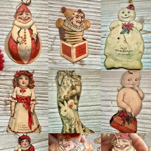 May include: A collection of vintage Christmas ornaments. The ornaments include a snowman with "Best Christmas Wishes", a clown in a box with "A Merry Xmas", a baby with a bag that says "Xmas Joys", and a girl with "For a Happy Christmas".