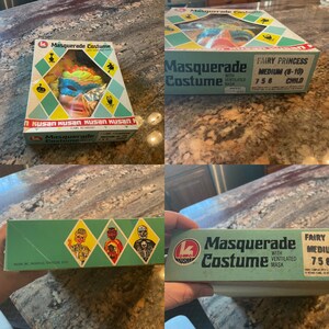 May include: A vintage Kusan brand fairy princess masquerade costume box with a green and white design. The box features a picture of a child wearing a mask and a fairy princess costume. The text on the box reads "Masquerade Costume with Ventilated Mask Fairy Princess Medium (8-10) 758 Child".