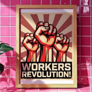 May include: Framed poster with a vintage design. The artwork features three raised fists in red and tan against a beige background with red sunburst rays. Bold text at the bottom reads "WORKERS REVOLUTION!"