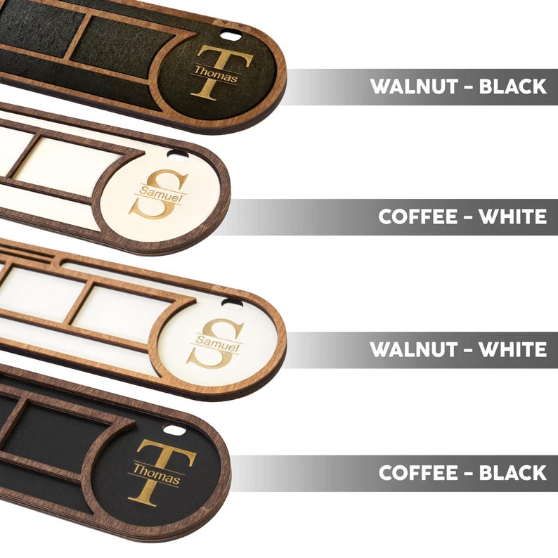 May include: Four wooden personalized keychains in walnut and coffee colors. Each keychain features a name or initial, with the text "Thomas" and "Samuel" visible. The keychains have a rectangular section and a circular section with a hole for a keyring.