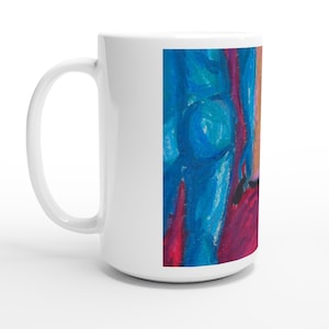 May include: White ceramic mug with a colorful abstract painting. The artwork features shades of blue, red, and orange, creating a vibrant and artistic design. The mug has a standard handle and a glossy finish.