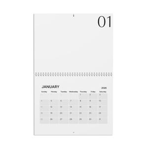 May include: A white wall calendar for January 2026, with a spiral binding at the top. The calendar displays the days of the month, with the number 01 prominently displayed at the top. The month of January is printed in a bold font.