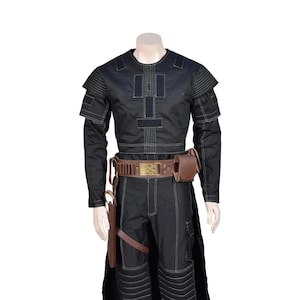 May include: A black tactical long-sleeve shirt and matching trousers featuring white contrast stitching, shoulder padding, and a brown leather utility belt with a gold-toned buckle, ammunition loops, a side pouch, and a holster attachment.