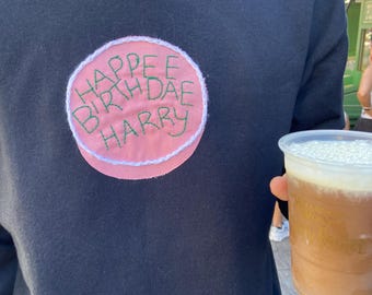 ハリー・ポッターの誕生日ケーキ柄スウェットシャツ