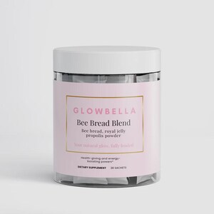 May include: A clear jar with a white lid, containing sachets. The jar has a pink label with the text "GLOWBELLA Bee Bread Blend" and details about the ingredients and benefits. The label also states "DIETARY SUPPLEMENT 30 SACHETS".