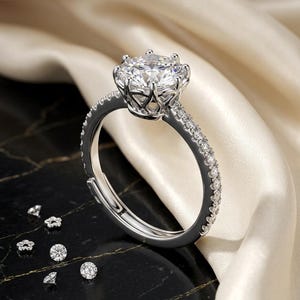 Rundslipad solitärring, vigselring i sterlingsilver, eleganta Halo-smycken