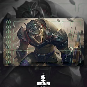 May include: A rectangular playmat featuring a green, reptilian humanoid warrior in dark armor with a sharp blade. The design includes a vertical column of numbered circles from zero to eight on the left side and a grid of light green outlines.
