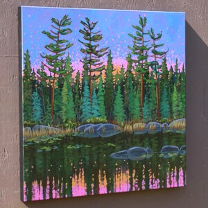 Tall tree painting of lake in pink, purple, and green.