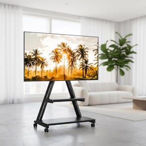 May include: A black TV stand with a large screen displaying a tropical scene with palm trees. The stand has a unique A-frame design with shelves and rolling wheels, set in a modern living room.
