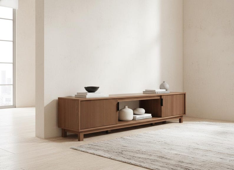 70 inch mocha fluted TV stand styled in modern living room with large flat screen TV