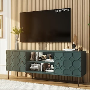 May include: A teal-colored TV stand with geometric door panels and a black top. The stand has open shelving with books and decorative items. A large black TV is mounted above the stand, with the text "Up to 70" TV".