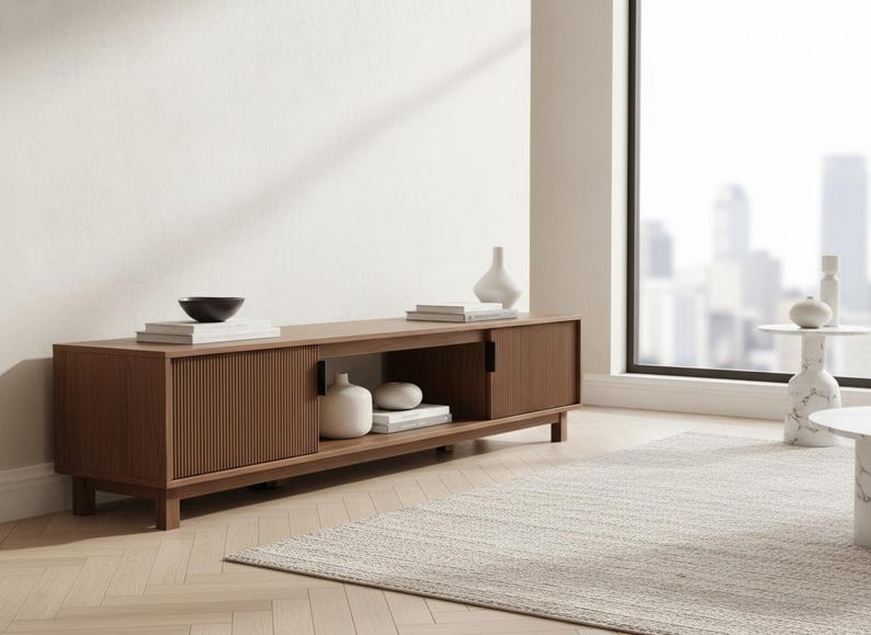 Interior storage compartment with organized media devices