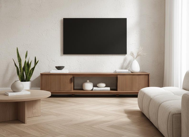 Close up of vertical fluted hardwood detailing on mocha media console