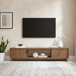 Front view of 70 inch TV stand with closed storage cabinet doors