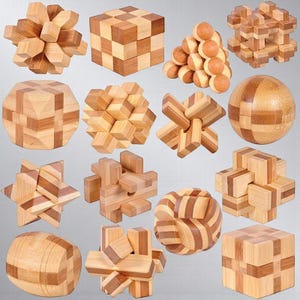 May include: A selection of wooden brain teaser puzzles in diverse forms, such as cubes, spheres, and starburst designs. The puzzles are crafted from light and dark brown wood, displaying the natural grain.