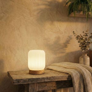 May include: A set of three ceramic mugs with a speckled, matte finish. The mugs are in shades of cream, light gray, and dark gray. Each mug has a simple, minimalist design, perfect for coffee or tea.