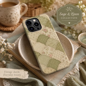 May include: A smartphone case featuring a scalloped patchwork pattern in shades of sage green, cream, and soft pink with floral and dotted motifs. The design includes a camera cutout and a protective shell for a mobile device.