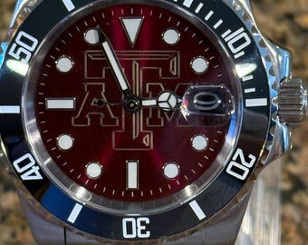 A&M logo Watch automatic