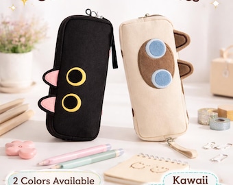 May include: Two rectangular pencil cases with cat-themed designs. One is black with yellow eyes and pink-lined ears. The other is cream-colored with brown patches, blue eyes, and brown ears. Text reads: Cute Cat Pencil Cases, 2 Colors Available, Kawaii Plush Pouches.