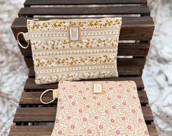Ręcznie robiona saszetka z kwiatowym motywem zapinana na zamek | Bawełniana kosmetyczka i torba na akcesoria | Mała saszetka na co dzień