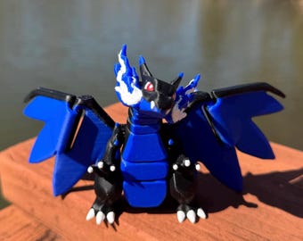 Figura articulada flexible de Charizard de Pokémon impresa en 3D