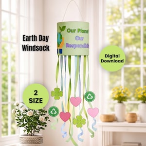 May include: An Earth Day windsock with the text "Our Planet Our Responsibility." The cylindrical decoration features green, blue, and white ribbons, with attached hearts, clovers, and recycling symbols. The words "2 SIZE" and "Digital Download" are also visible.