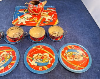 Juego de té vintage de los años 30 con diseño de niñas disfrazadas de gatitas, de Ohio Art Toy.