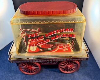 Máquina de palomitas de maíz Sunbeam Great American, modelo 1976, tipo vagón, número 18-90.